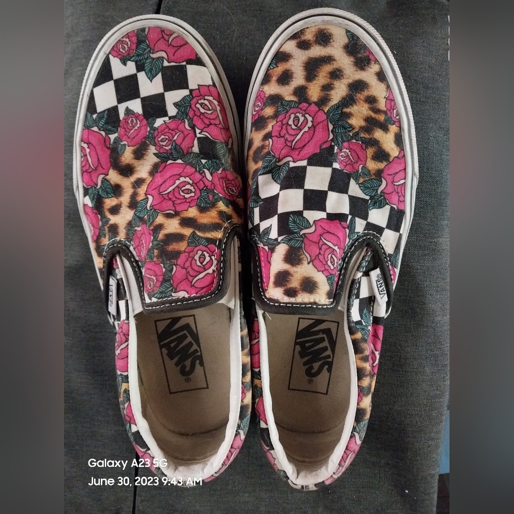 woman’s cheetah/checkered slip on vans .5. worn a few times.
